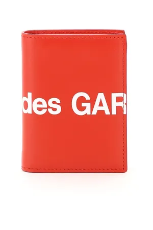 Comme des garcons wallet small bifold wallet with huge logo